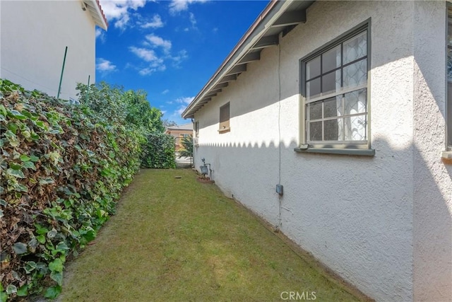 4134 Rio Hondo Ave, Rosemead, CA 91770 - view of property exterior with stucco siding and a lawn