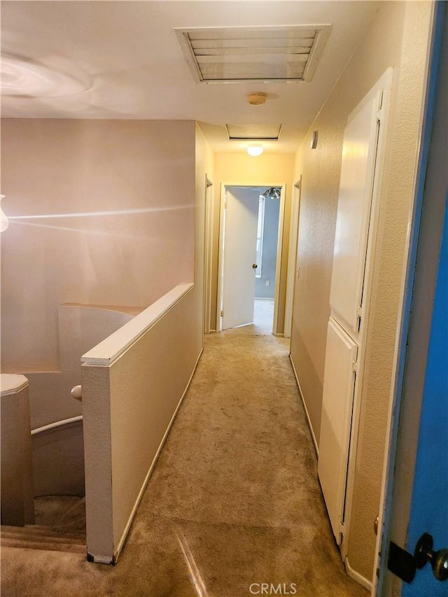 186 S Massachusetts St, Lake Elsinore, CA 92530 - hallway featuring carpet floors and an upstairs landing