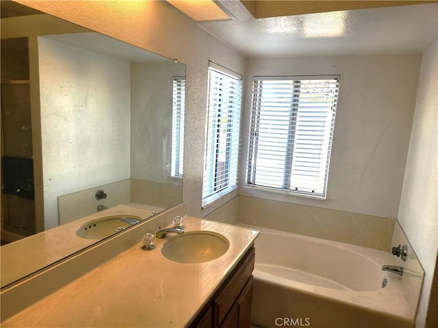186 S Massachusetts St, Lake Elsinore, CA 92530 - bathroom with a bath and vanity