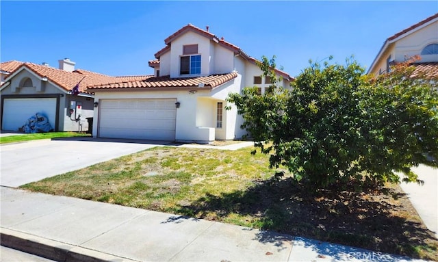 186 S Massachusetts St, Lake Elsinore, CA 92530 - mediterranean / spanish-style house featuring a tile roof, stucco siding, concrete driveway, a garage, and a front yard