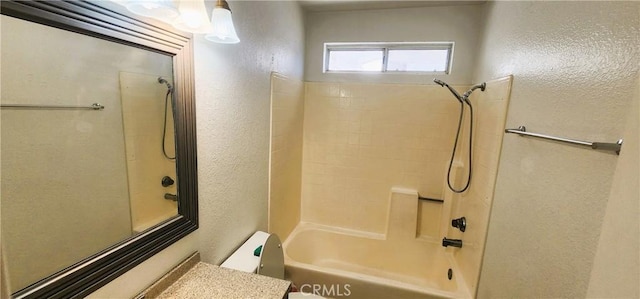 186 S Massachusetts St, Lake Elsinore, CA 92530 - bathroom featuring a textured wall, bathing tub / shower combination, and vanity