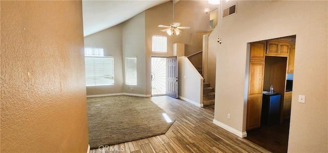 186 S Massachusetts St, Lake Elsinore, CA 92530 - entrance foyer with ceiling fan, stairs, high vaulted ceiling, and wood finished floors