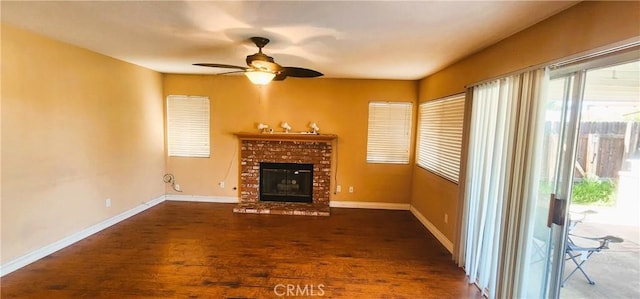186 S Massachusetts St, Lake Elsinore, CA 92530 - unfurnished living room with a brick fireplace, wood finished floors, and a ceiling fan