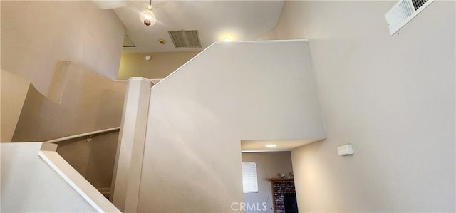 186 S Massachusetts St, Lake Elsinore, CA 92530 - stairway featuring a fireplace and a high ceiling