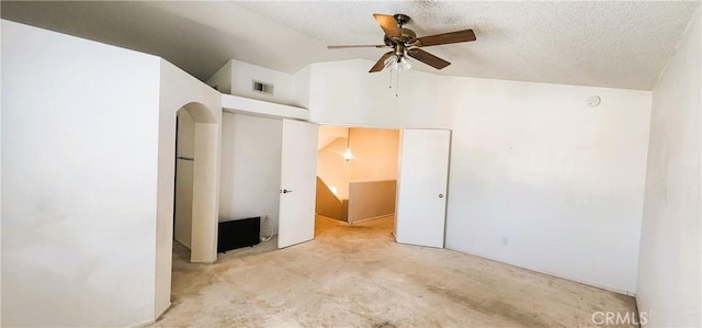 186 S Massachusetts St, Lake Elsinore, CA 92530 - unfurnished bedroom featuring vaulted ceiling, carpet, a textured ceiling, and ceiling fan