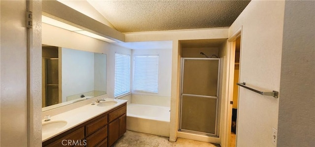 186 S Massachusetts St, Lake Elsinore, CA 92530 - bathroom featuring a stall shower, a garden tub, lofted ceiling, double vanity, and a textured ceiling