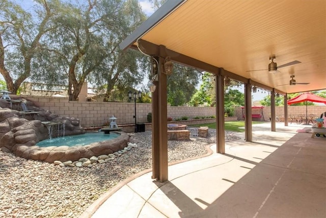 7145 Sunnyside Pl, Rancho Cucamonga, CA 91739 - fenced backyard with a patio area and ceiling fan