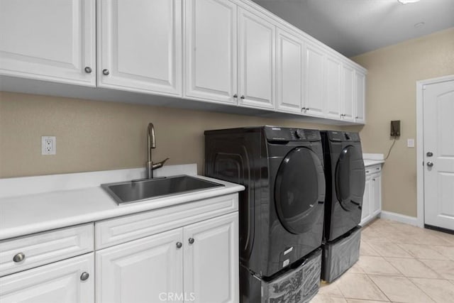7145 Sunnyside Pl, Rancho Cucamonga, CA 91739 - laundry room featuring cabinet space, washer and dryer, and light tile patterned floors