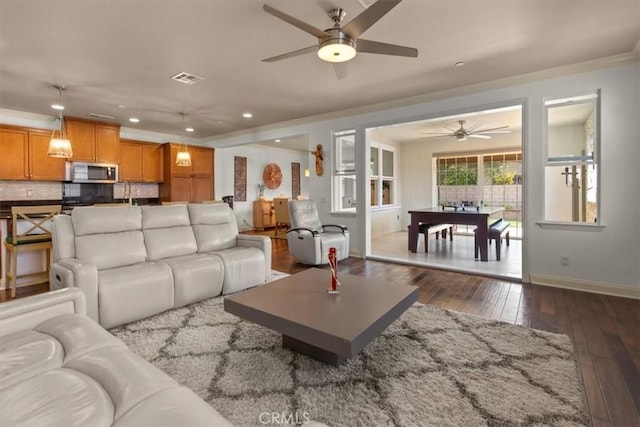 7145 Sunnyside Pl, Rancho Cucamonga, CA 91739 - living room with ceiling fan, dark wood-type flooring, crown molding, and recessed lighting