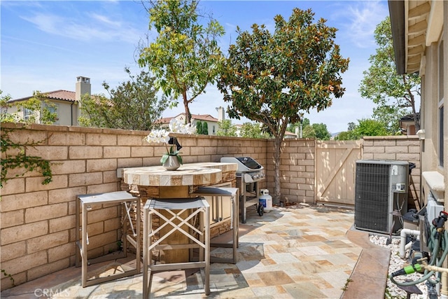 35 Twin Gables, Irvine, CA 92620 - fenced backyard with a patio and grilling area