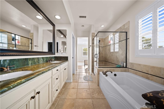 35 Twin Gables, Irvine, CA 92620 - full bathroom featuring plenty of natural light, a bath, a shower stall, double vanity, and recessed lighting