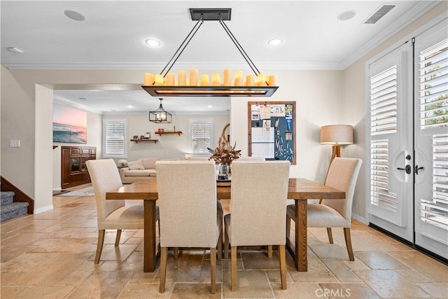 35 Twin Gables, Irvine, CA 92620 - dining area featuring ornamental molding, stone tile flooring, a chandelier, recessed lighting, and stairs
