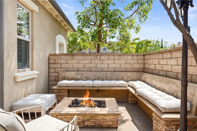 35 Twin Gables, Irvine, CA 92620 - view of patio with an outdoor living space with a fire pit
