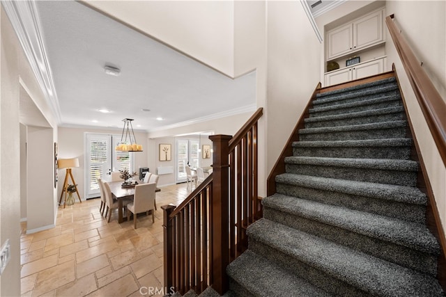 35 Twin Gables, Irvine, CA 92620 - stairs featuring crown molding, stone tile floors, and recessed lighting
