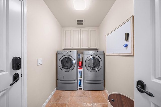 35 Twin Gables, Irvine, CA 92620 - washroom featuring independent washer and dryer, cabinet space, and light stone finish flooring