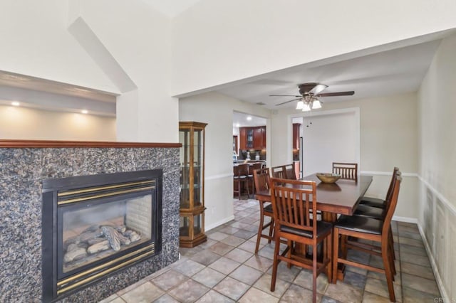5070 Limerick Ave, Clairemont Mesa, CA 92117 - dining space with a fireplace and ceiling fan