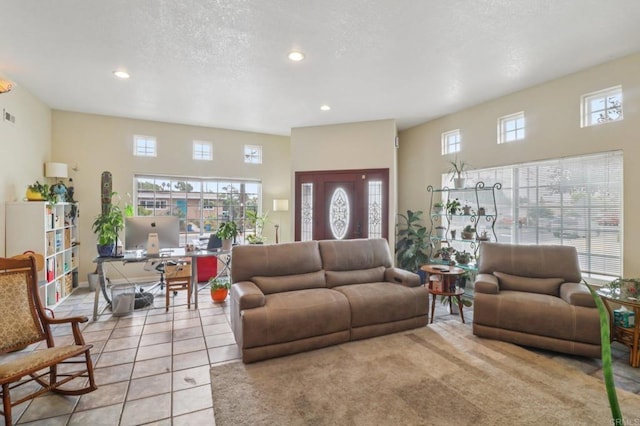 5070 Limerick Ave, Clairemont Mesa, CA 92117 - living room with recessed lighting, a desk, and light tile patterned floors