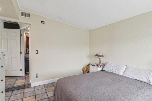 5070 Limerick Ave, Clairemont Mesa, CA 92117 - bedroom featuring baseboards and crown molding