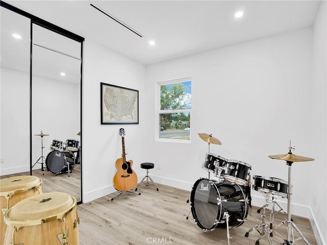 7055 Fallbrook Ave, West Hills, CA 91307 - misc room featuring light wood-style flooring and recessed lighting