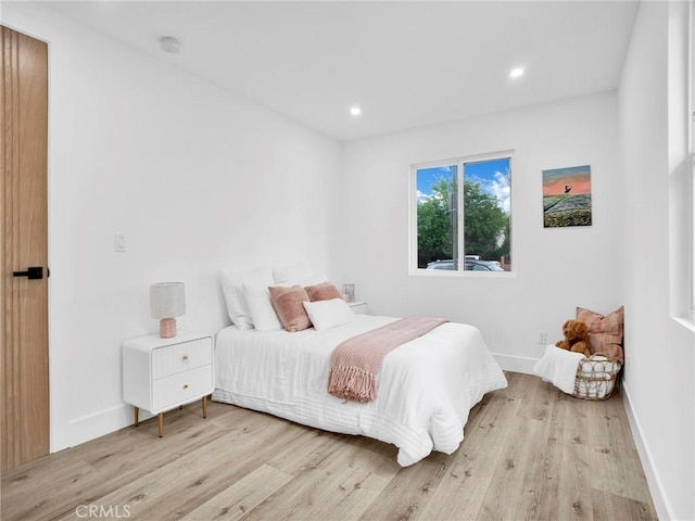 7055 Fallbrook Ave, West Hills, CA 91307 - bedroom featuring light wood-style floors and recessed lighting