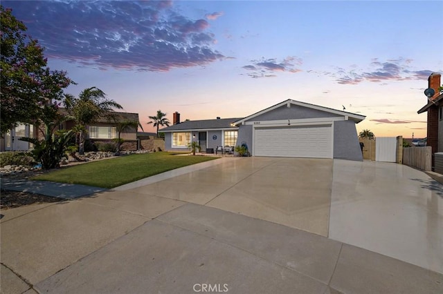 6963 Shamrock Ln, Rancho Cucamonga, CA 91701 - ranch-style house with a garage, concrete driveway, and stucco siding