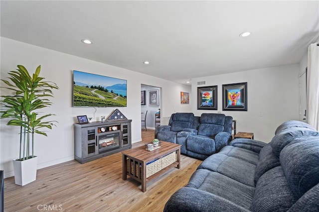 6963 Shamrock Ln, Rancho Cucamonga, CA 91701 - living room featuring recessed lighting and light wood-style flooring