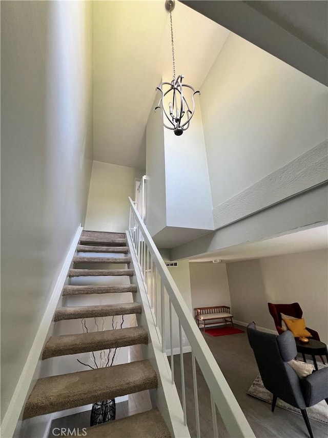 1231 S Golden W Ave Unit 24, Arcadia, CA 91007 - stairs featuring high vaulted ceiling, carpet flooring, and a chandelier