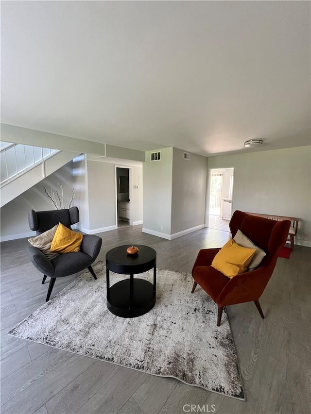 1231 S Golden W Ave Unit 24, Arcadia, CA 91007 - sitting room with wood finished floors and baseboards