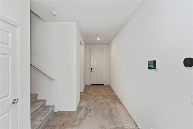 21288 Telegraph Rd, Riverside, CA 92507 - hall with light colored carpet, stairway, and recessed lighting