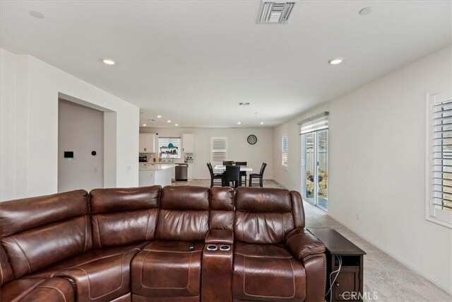 21288 Telegraph Rd, Riverside, CA 92507 - living area featuring light colored carpet and recessed lighting