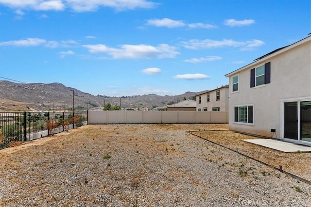 21288 Telegraph Rd, Riverside, CA 92507 - view of yard featuring a mountain view and a patio