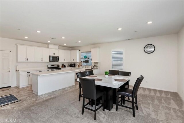 21288 Telegraph Rd, Riverside, CA 92507 - dining room with recessed lighting and light carpet