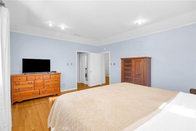 929 E Marshall Pl, Long Beach, CA 90807 - bedroom featuring light wood-style flooring and ornamental molding
