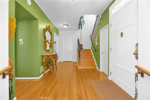 929 E Marshall Pl, Long Beach, CA 90807 - hallway with stairway and light wood-type flooring