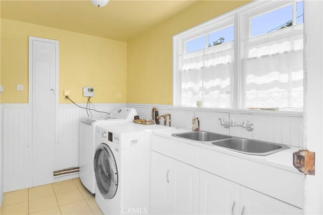 929 E Marshall Pl, Long Beach, CA 90807 - laundry room featuring separate washer and dryer, wainscoting, cabinet space, and light tile patterned floors