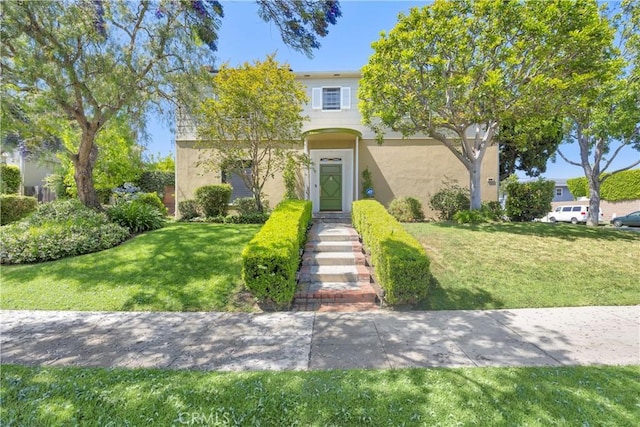 929 E Marshall Pl, Long Beach, CA 90807 - view of front of home featuring a front lawn and stucco siding