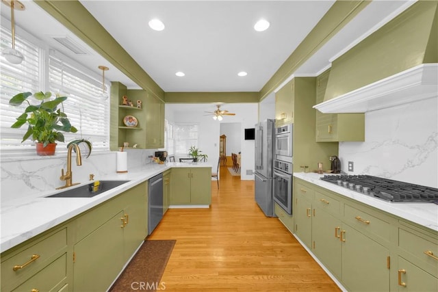929 E Marshall Pl, Long Beach, CA 90807 - kitchen featuring green cabinetry, stainless steel appliances, light countertops, light wood-style flooring, and recessed lighting