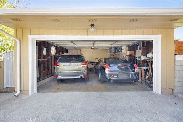 929 E Marshall Pl, Long Beach, CA 90807 - garage featuring driveway and a garage door opener