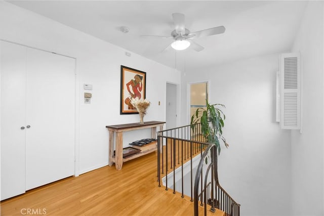 929 E Marshall Pl, Long Beach, CA 90807 - hallway featuring an upstairs landing and light wood-type flooring