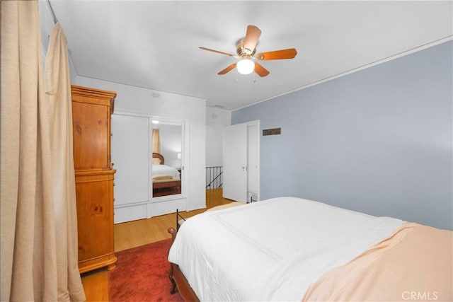 929 E Marshall Pl, Long Beach, CA 90807 - bedroom with wood finished floors and a ceiling fan