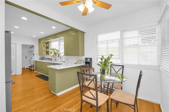 929 E Marshall Pl, Long Beach, CA 90807 - kitchen featuring green cabinets, a peninsula, ceiling fan, light wood-type flooring, and recessed lighting