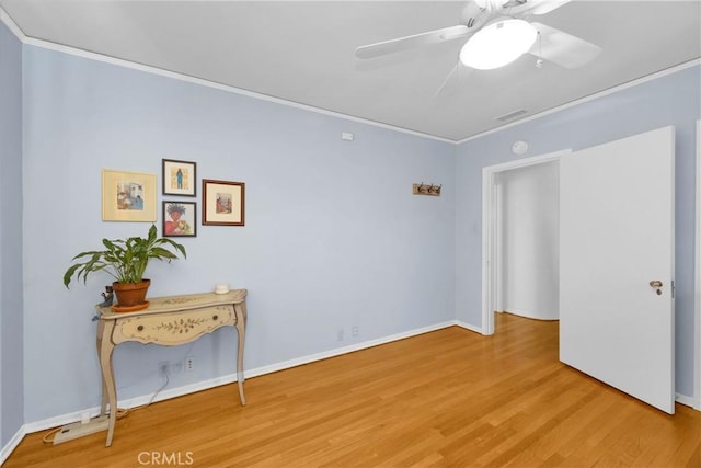 929 E Marshall Pl, Long Beach, CA 90807 - unfurnished room with ceiling fan, wood finished floors, and ornamental molding