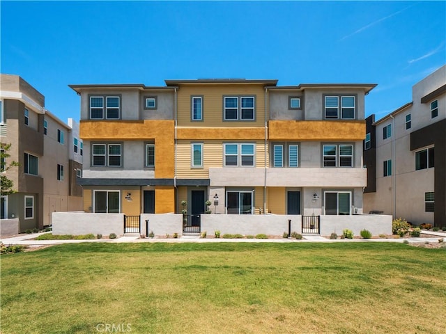 27148 Valley Oak Pl, Valencia, CA 91381 - view of front of home with a front lawn, stucco siding, and a gate