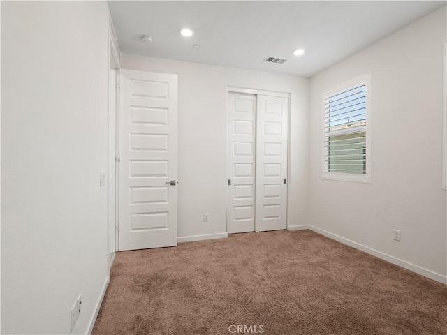 27148 Valley Oak Pl, Valencia, CA 91381 - unfurnished bedroom featuring carpet flooring, a closet, and recessed lighting