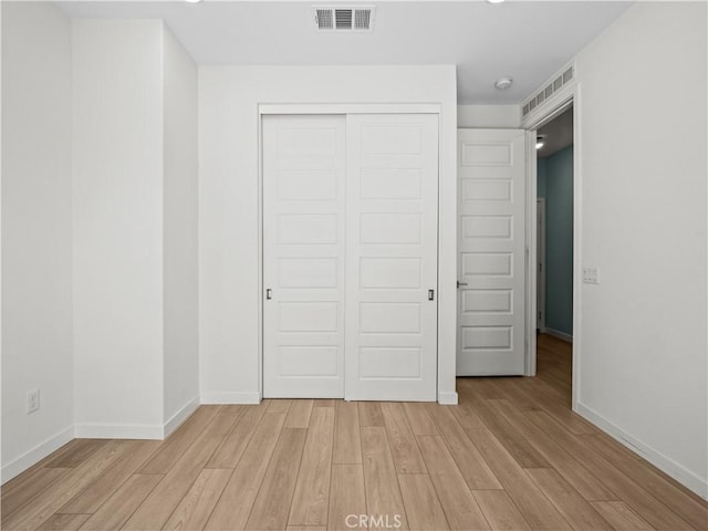 27148 Valley Oak Pl, Valencia, CA 91381 - unfurnished bedroom featuring light wood-style floors and a closet