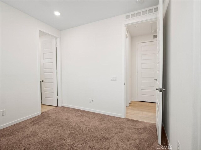 27148 Valley Oak Pl, Valencia, CA 91381 - unfurnished room with light carpet and recessed lighting