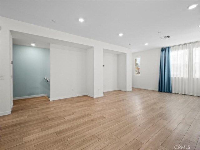 27148 Valley Oak Pl, Valencia, CA 91381 - empty room featuring light wood-style flooring and recessed lighting