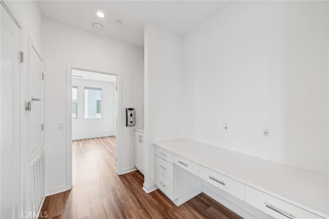 301 Placemark, Irvine, CA 92614 - corridor with dark wood-style floors and baseboards