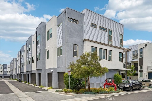 301 Placemark, Irvine, CA 92614 - view of property with a residential view and an attached garage