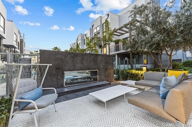 301 Placemark, Irvine, CA 92614 - view of patio / terrace with an outdoor living space with a fireplace and a residential view